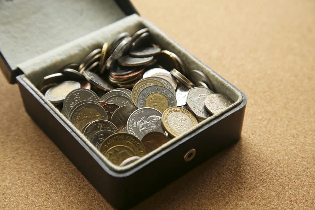 Money from around the world inside a box.